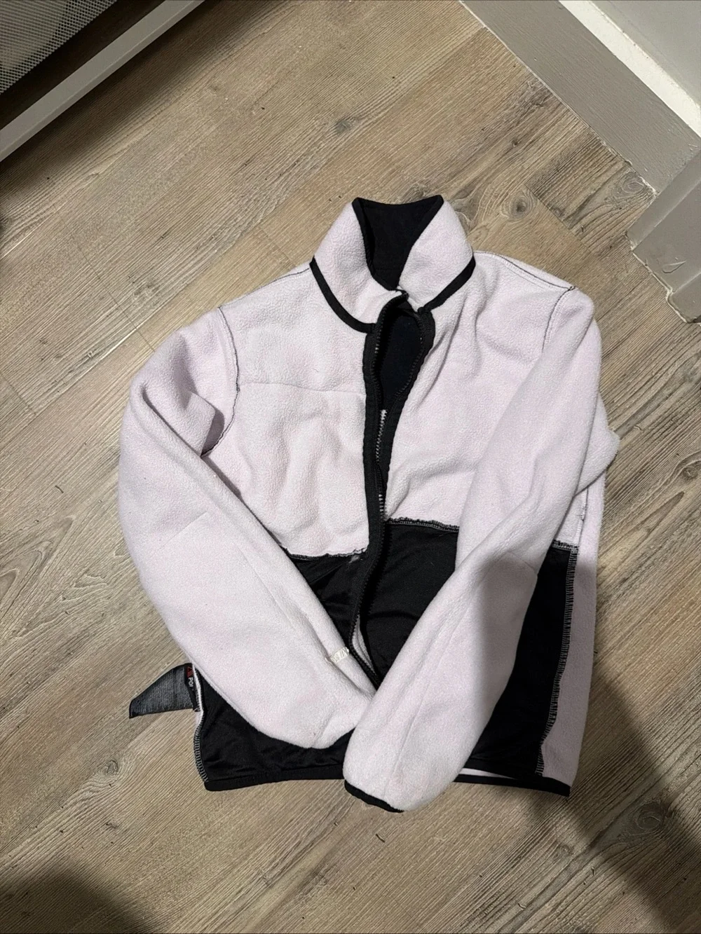 The North Face Kids Light Pink and Black Fleece Jacket
